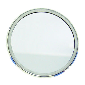 Photo of a pocket mirror on its back with the mirror showing.