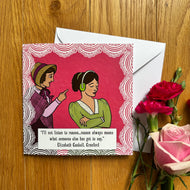 Greeting card with illustration of two women in Victorian clothing, one wagging her finger at the other who is wearing headphones, and a quote “I’ll not listen to reason…reason always means what someone else has got to say.” from Gaskell’s Cranford. The card is on a wooden surface with flowers.