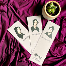 Load image into Gallery viewer, Photo of bookmarks laid out next to a tiny plant. The bookmarks are spread out and feature the portraits of the sisters with a Goth makeover, and &quot;#TeamEmily&quot;, &quot;#TeamCharlotte&quot; and &quot;#TeamAnne&quot; beneath.