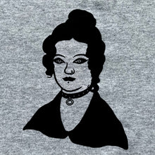 Load image into Gallery viewer, Close up of Charlotte Bronte who is wearing a black studded collar with a ring at the front. She has a nose ring and a lip piercing and dramatic eye make up.