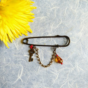 Liberty Amber-Key pin brooch